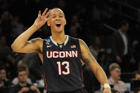 In the closing seconds of the game, Connecticut Huskies guard Shabazz Napier (13) celebrates at the end of the NCAA Tournaments East Regional final. The Connecticut Huskies defeated the Michigan State Spartans, 60-54, at Madison Square Garden in New York on Sunday, March 30, 2014. (Richard Messina/Hartford Courant/MCT)