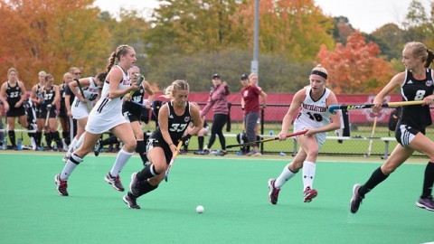 Nicole Miller takes the ball during Sundays game against Northeastern. Katherine Mayo/Daily Collegian)