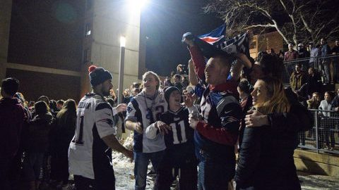 Students celebrate the Patriots winning the Super Bowl in Southwest Sunday night. Katherine Mayo)