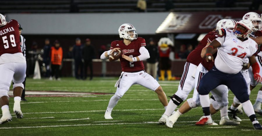 UMass comes back in fourth quarter to defeat Liberty in triple overtime