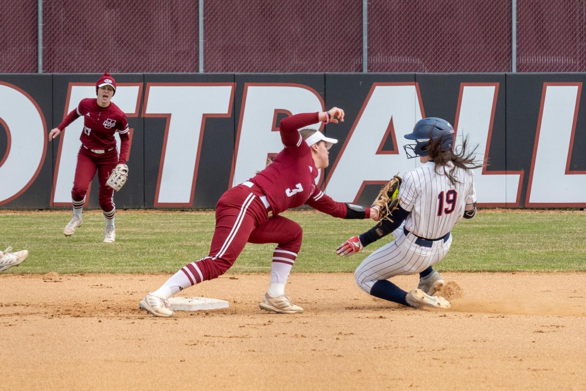 Abby Packard tags the runner out at second at Sortino Field on 4/7/24.