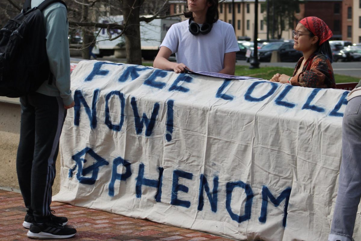 PHENOM held a protest in opposition of the hike in tuition, dining, and housing fees in front of the Whitmore Administrative Building on 04/10/2024. The sign reads: FREE COLLEGE NOW! PHENOM