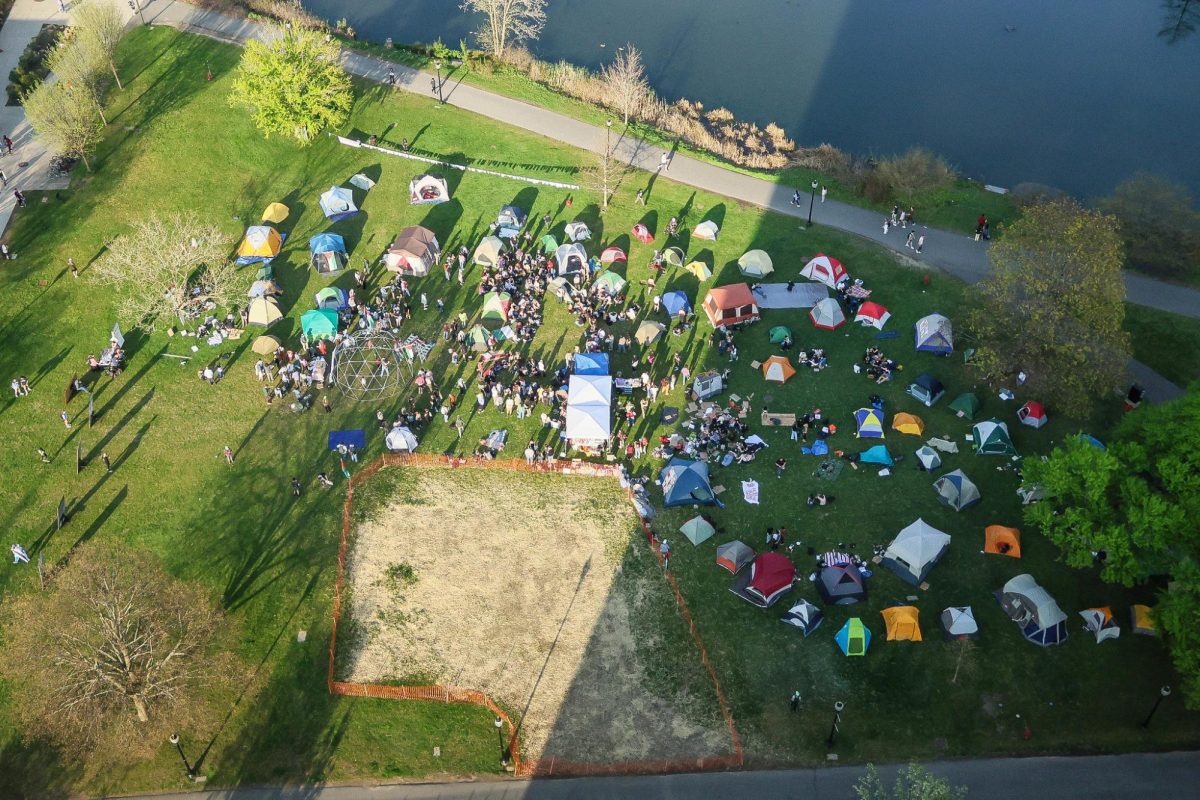 The UMass Students for Justice in Palestine organize an encampment as a form of protest on the lawn near the campus pond, beginning on the morning of April 29th, 2024.