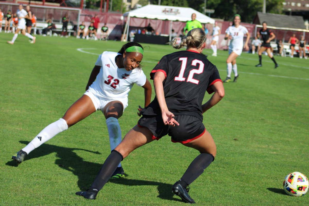 Junior Nia Hislop protects the ball as the UMass Minutewomen took on Northeastern at Rudd Field on 09/05/2024.