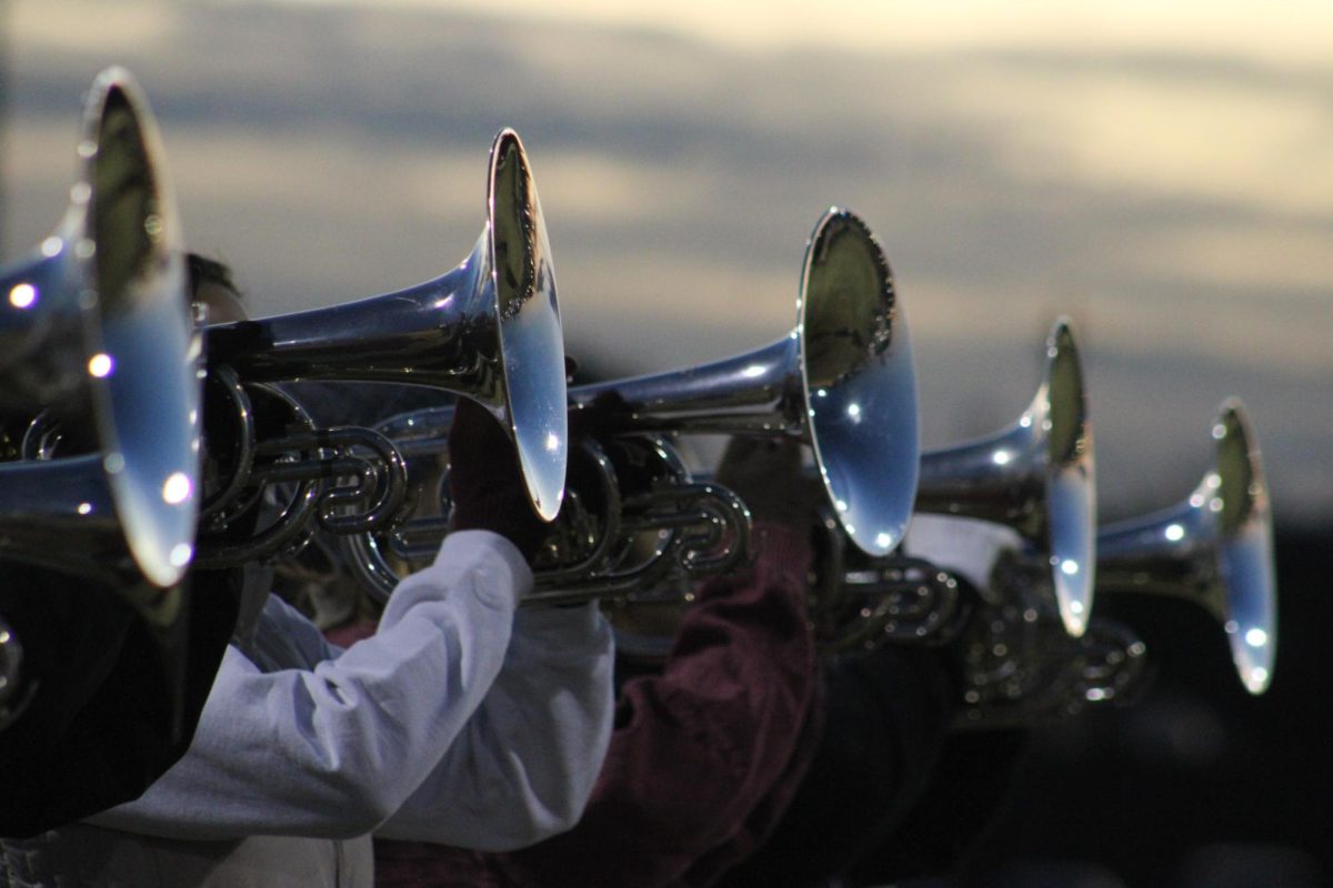 The UMass Marching Band prepares for the Macy's Thanksgiving Parade on the fields behind the John Francis Kennedy Champions Center on 11/19/2024.