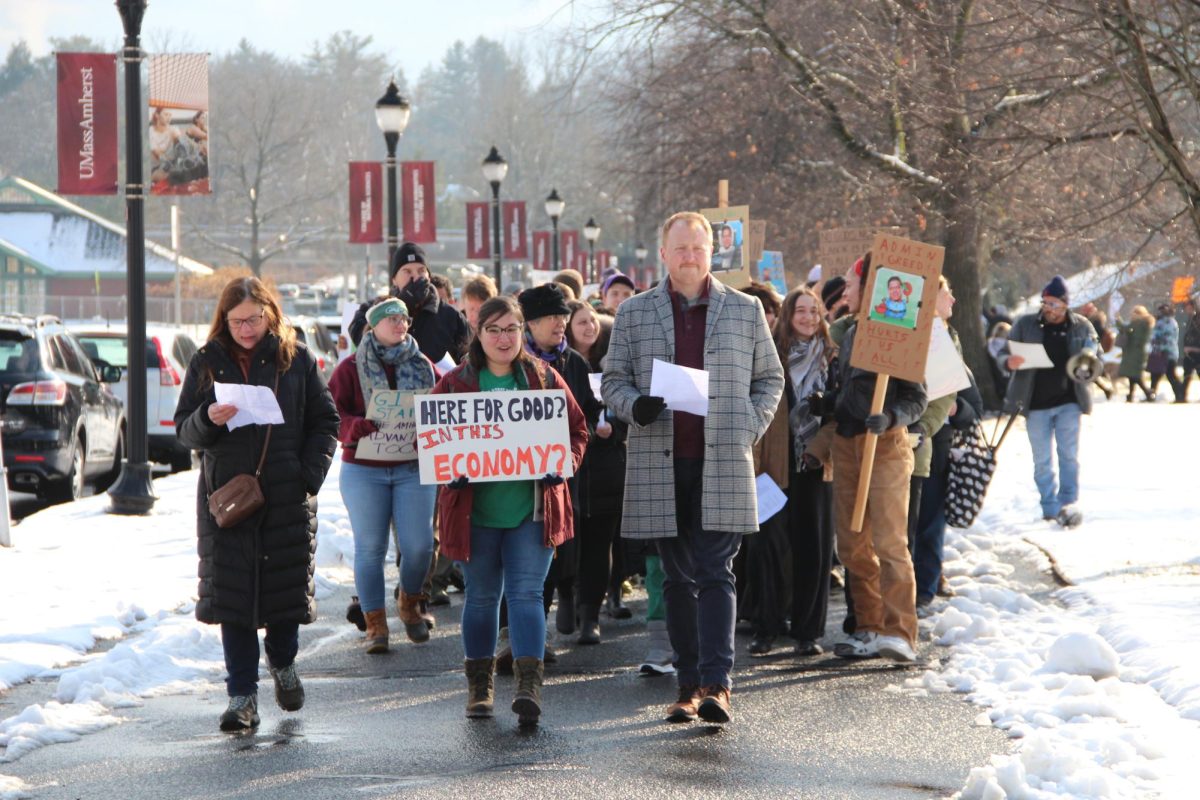 UMass labor union groups demonstrate in front of the Whitmore Administration Building to demand fair wages on 12/05/2024